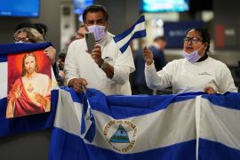 Activists await the arrival of more than 200 Nicaraguan political prisoners in the US