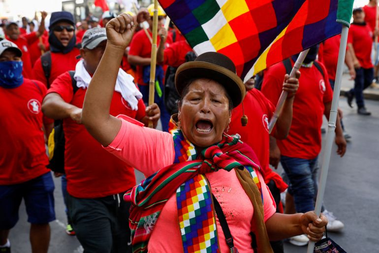 A woman gestures as demonstrators call for an indefinite nationwide strike during a march against the government of Peru's President Dina Boluarte, in Lima, Peru, February 9, 2023. REUTERS/Alessandro Cinque
