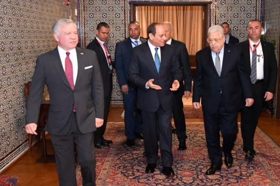 Egyptian President Abdel Fattah al-Sisi (C) talks with Palestinian President Mahmoud Abbas and Jordan's King Abdullah II before departing from Cairo Airport after attending the Jerusalem resilience and development conference with Arab leaders at the Arab League's headquarters in Cairo, Egypt, February 12, 2023 in this handout picture courtesy of the Egyptian Presidency. The Egyptian Presidency/Handout via REUTERS ATTENTION EDITORS - THIS IMAGE HAS BEEN SUPPLIED BY A THIRD PARTY.