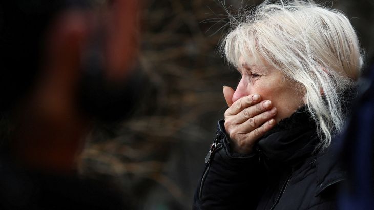 A woman reacts after a shelling near a bus station, amid Russia's attack on Ukraine, in Kherson, Ukraine February 21, 2023. REUTERS/Lisi Niesner TPX IMAGES OF THE DAY