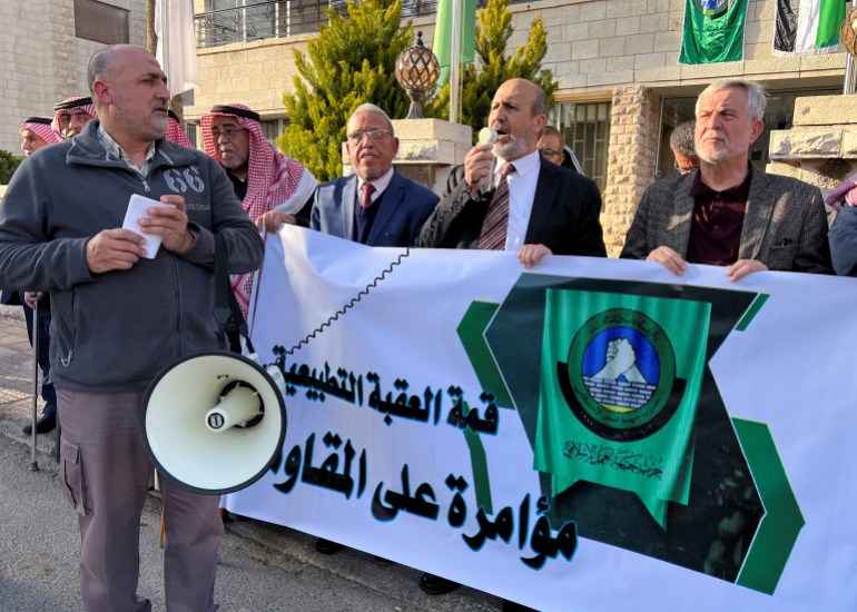 Members of the Islamic Action Front protest against the meeting between top Israeli and Palestinian officials at the Red Sea port of Aqaba, in Amman, Jordan February 26, 2023