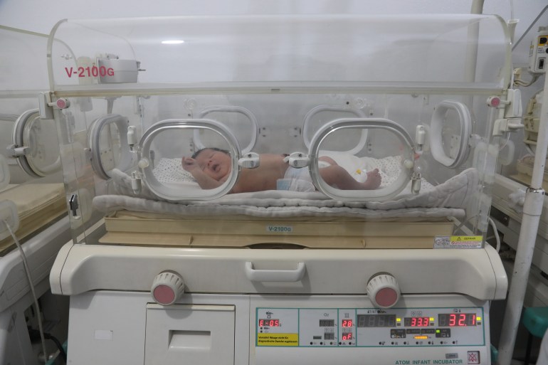 Baby Aya in her incubator