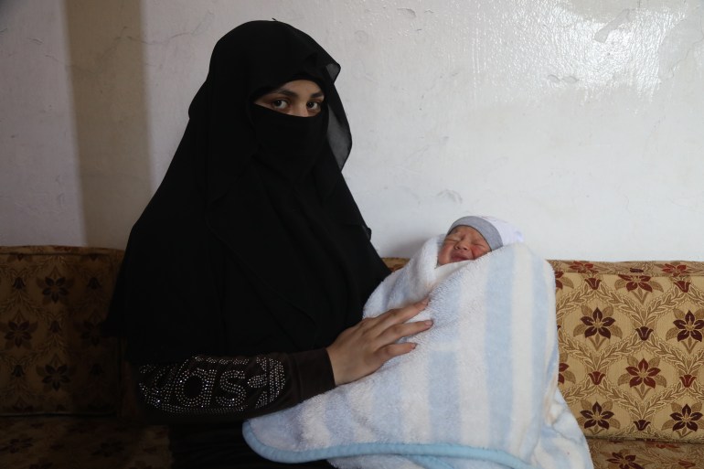 Sakhaa al-Mousa lost her husband and two young boys in the earthquake, gave birth to another son days after she was pulled out from beneath the rubble in Atarib, northwest Syria