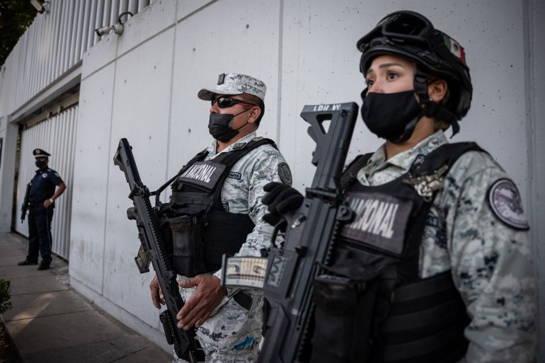 Members of the Mexican National Guard outside the Attorney General's office in Mexico City after Ovidio Guzman's arrest in January.