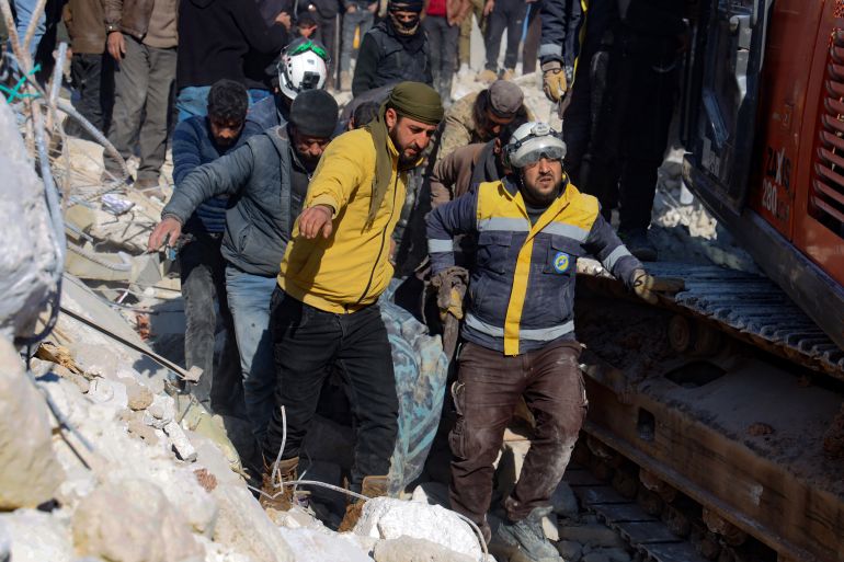 Civilians and White Helmet rescue wokers