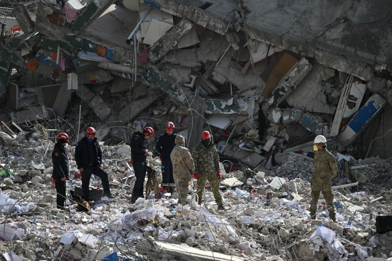 Rescue teams continue to search victims and survivors after a 7.8 magnitude earthquake struck the border region of Turkey and Syria earlier in the week, in Kahramanmaras, on February 14, 2023. (Photo by OZAN KOSE / AFP)