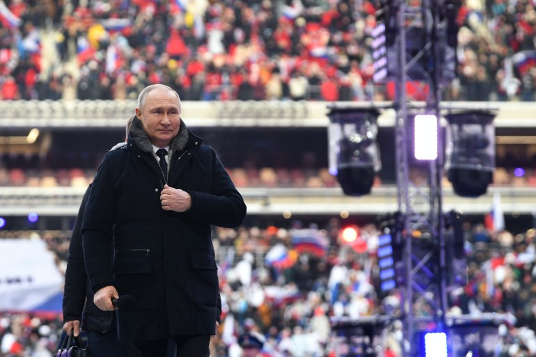 Vladimir Putin attends a patriotic concert 