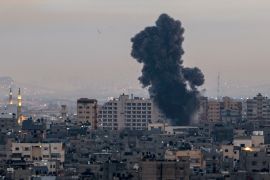 Smoke rises above buildings in Gaza City as Israel launched air strikes on the Palestinian enclave early on February 23, 2023.