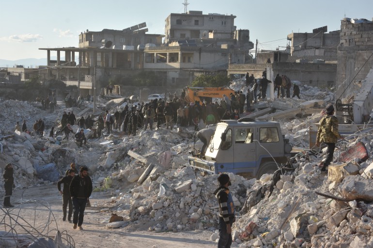 Personnel and civilians conduct search and rescue operations in Idlib, Syria after earthquakes 