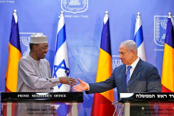Israeli Prime Minister Benjamin Netanyahu, right, goes to shake hands with President of Chad Idriss Deby in November 2018