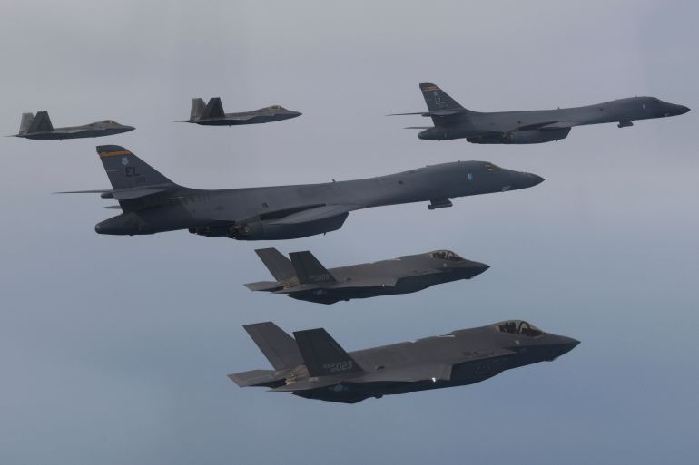 U.S. Air Force B-1B bombers, F-22 fighter jets and South Korean Air Force F-35 fighter jets fly over South Korea Peninsula during a joint air drill in South Korea,