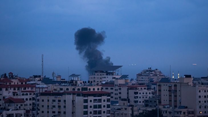 Smoke rises following an Israeli airstrike in the western Gaza Strip, Thursday