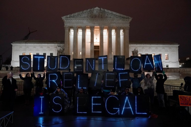 Student debt relief advocates gather outside the Supreme Court on Capitol Hill in Washington