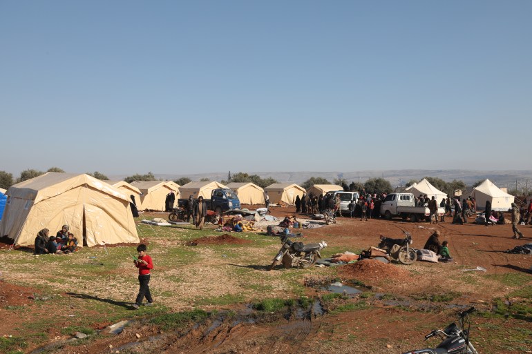 view of tents set up to house people whoses houses fell