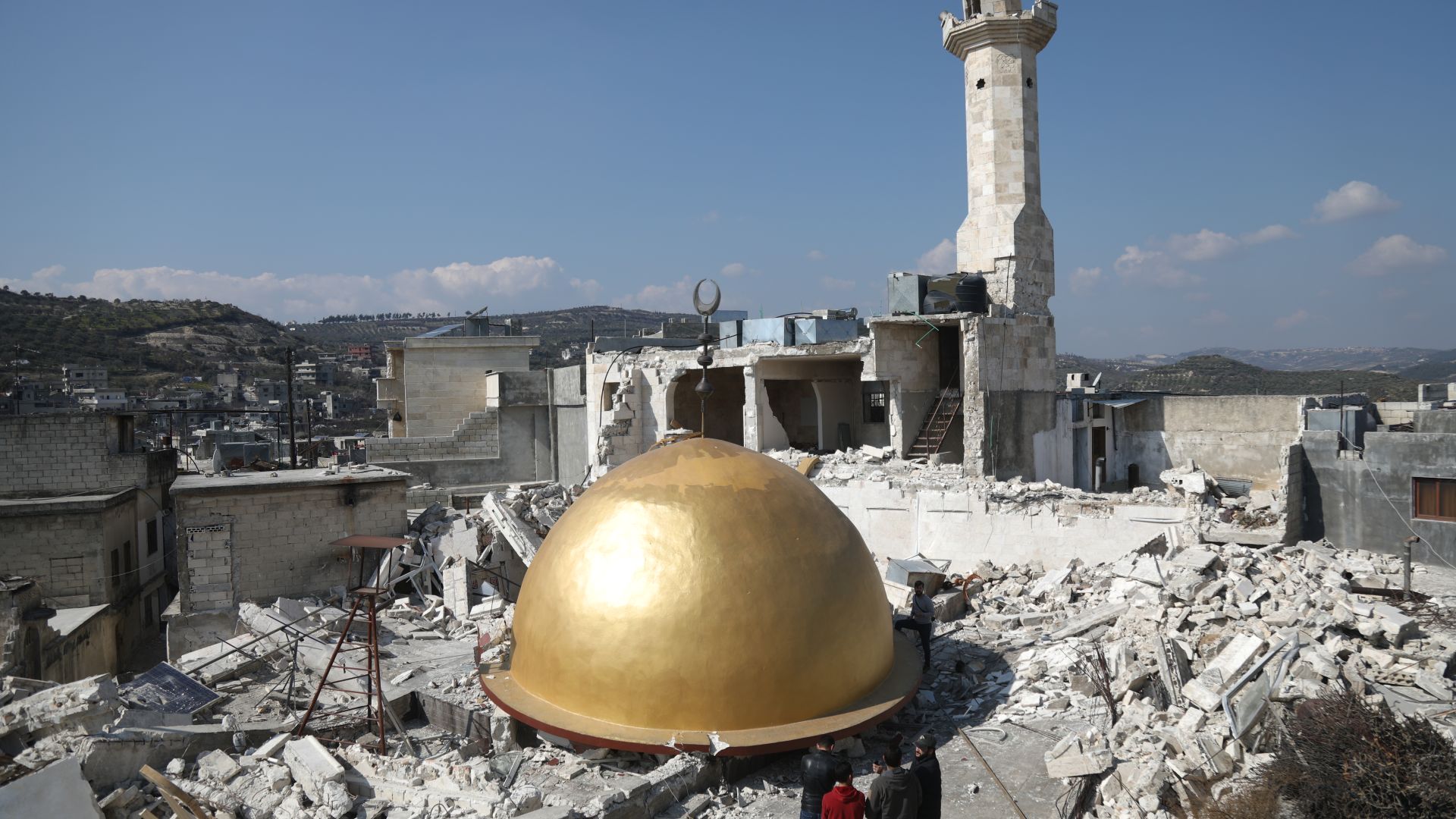 The Maland mosque's dome fallen on the ground after the earthquake destroyed the structure