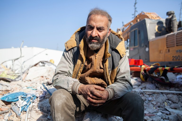 Mohamed, 46, sits by the rescue site all day and night waiting for the time to come for his brother’s body to be extracted from the same building