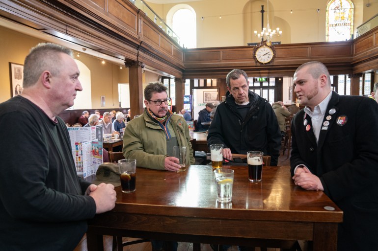 Union members gather in a pub in England