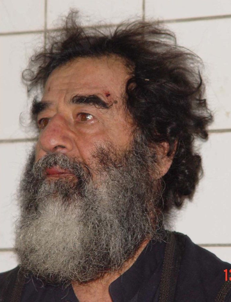 A photo of Saddam Hussein after his capture