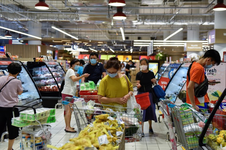 Shoppers in a supermarket in Singapore.