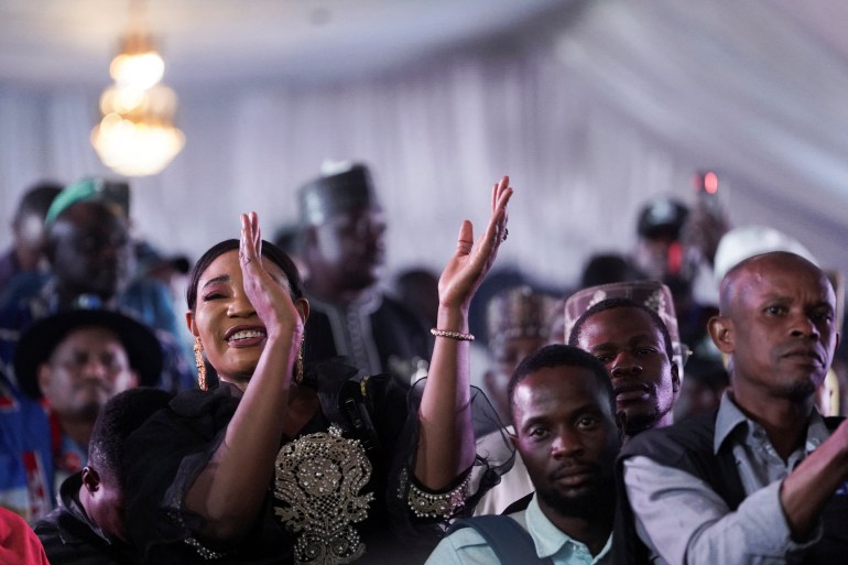 A supporter of Bola Ahmed Tinubu celebrates after he was declared winner in Nigeria's presidential election, at the Party's campaign headquarters, in Abuja 