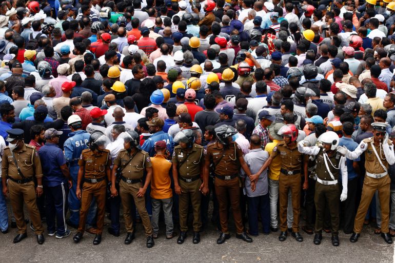 Colombo harbour union members protest during a strike against huge tax increase in Colombo
