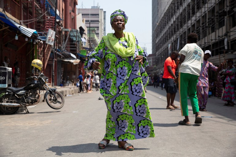 A woman dances in celebration of Bola Ahmed Tinubu's victory in an election that has been disputed by opposition parties, in Lagos