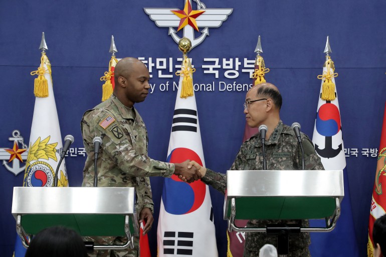 Col. Isaac Taylor of the United Nations Command (UNC), Combined Forces Command (CFC), and United States Forces Korea (USFK) and Col. Lee Sung-jun of South Korea's Joint Chiefs of Staff attend the press briefing of 2023 Freedom Shield Exercise at the Defense Ministry on March 03, 2023 in Seoul, South Korea. Chung Sung-Jun/Pool via REUTERS