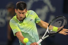 Novak Djokovic during a match in Dubai in March. He is playing a back hand.