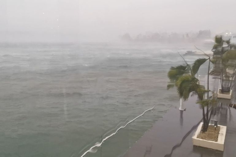 Trees sway in the wind as cyclone Kevin passes over Port Vila, Vanuatu March 3, 2023, in this screen grab obtained from a social media video.