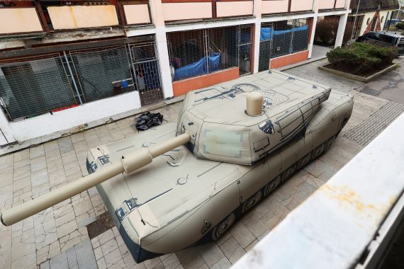 An inflatable decoy of a military vehicle is displayed during a media presentation in Decin, Czech Republic