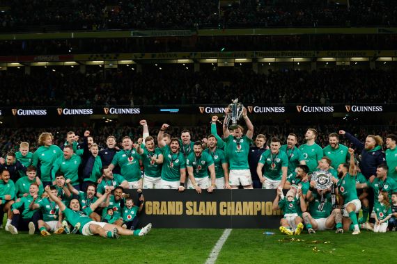Ireland players celebrate winning the Six Nations Championship