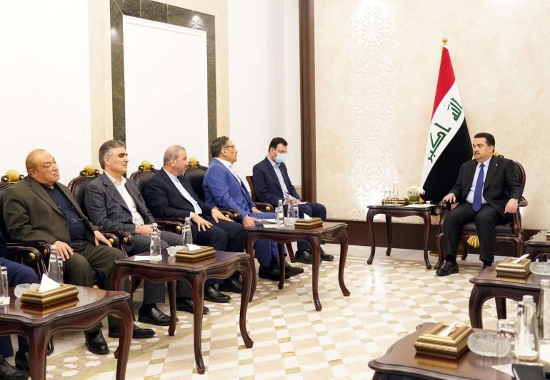 Iraqi Prime Minister Mohammed Shia al-Sudani meets with Iran's Supreme National Security Council secretary Ali Shamkhani, in Baghdad, Iraq, March 19, 2023. Iraqi Prime Minister Media Office/Handout via REUTERS ATTENTION EDITORS - THIS IMAGE WAS PROVIDED BY A THIRD PARTY.