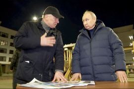 Vladimir Putin visits Russian-controlled Mariupol.