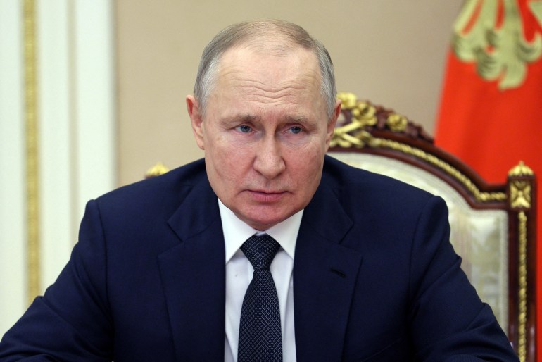 Russian President Vladimir Putin chairs a meeting with members of the Security Council via a video link in Moscow, Russia, March 24, 2023. Sputnik/Alexei Babushkin/Kremlin via REUTERS ATTENTION EDITORS - THIS IMAGE WAS PROVIDED BY A THIRD PARTY.