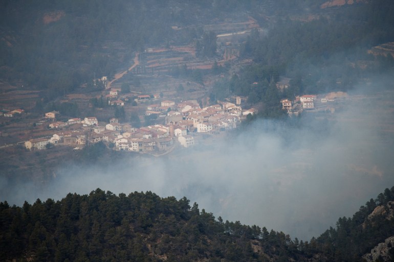Smoke rises during a wildfire in Los Calpes, Spain, March 24, 2023. REUTERS/Lorena Sopena