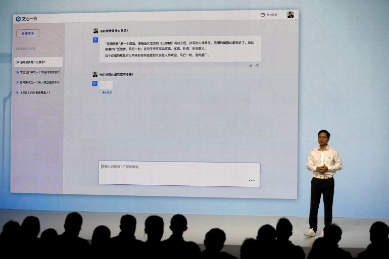 Baidu's cofounder and CEO Robin Li showcases an artificial intelligence powered chatbot known as Ernie Bot by Baidu, during a news conference at the company's headquarters in Beijing, China March 16, 2023.