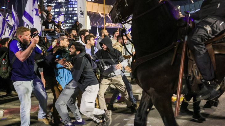 Protesters clash with police at a demonstration in Tel Aviv, Israel.
