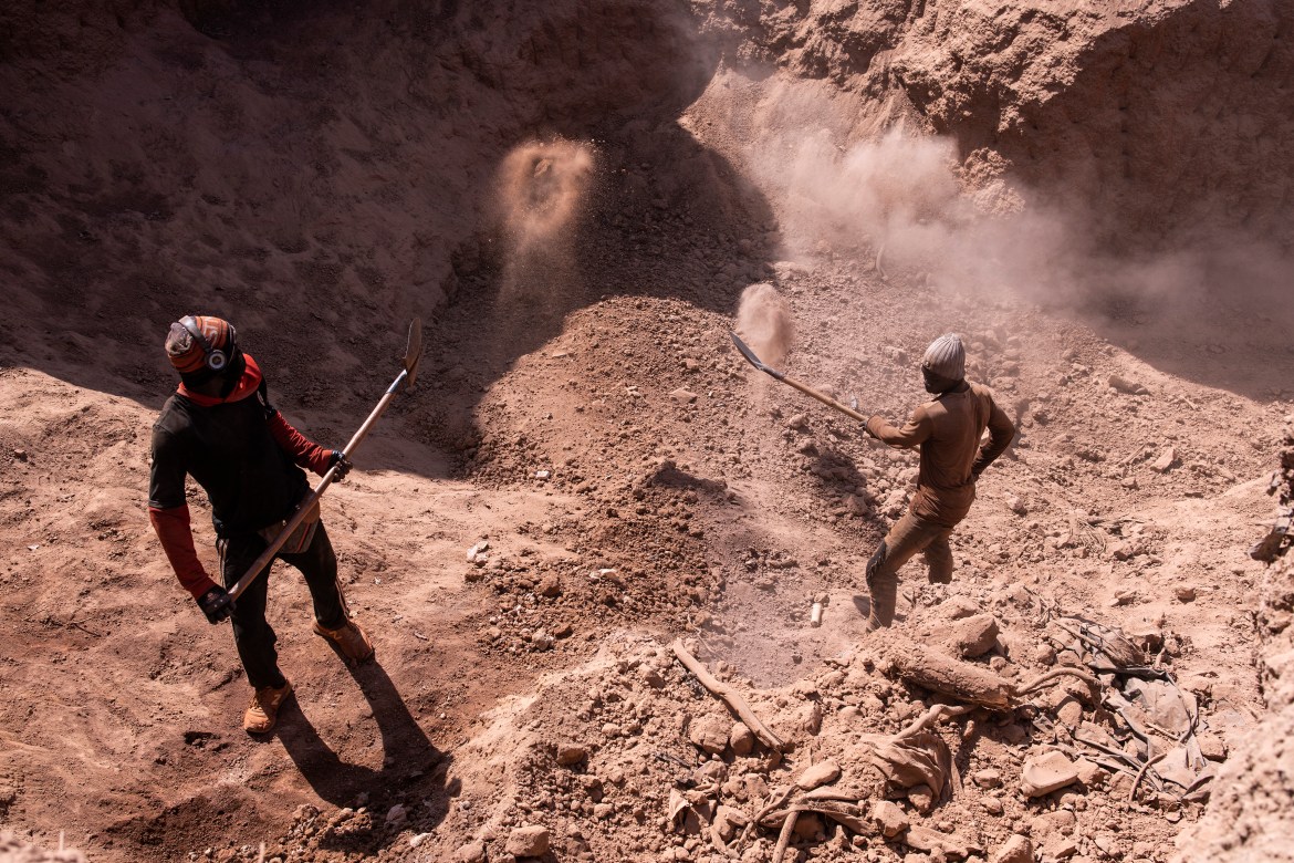 Artisanal gold miners dig into the cliffs at the Karakaene gold mine