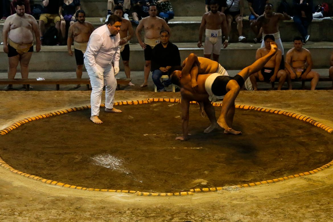 Sumo wrestlers fight during a Brazilian sumo championship bout, a qualifier for the South American championship, in Sao Paulo, Brazil