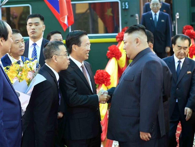 epa07397834 North Korean leader Kim Jong-un (R) shakes hand with politburo member and Secretary of the Party Central Committee Vo Van Thuong at Dong Dang Railway Station, to start his visit to Vietnam ahead of the US-North Korea summit hosted in Hanoi, at Dong Dang town, Lang Son province, Vietnam, 26 February 2019. The second meeting of the US President and the North Korean leader, running from 27 to 28 February 2019,