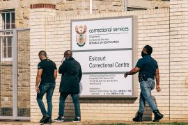 A picture taken on July 08, 2021 shows an official entering a Correctional Centre, South Africa