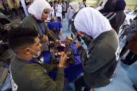 Libyan youths take part in the yearly First Tech Challenge, a country-wide robotics competition