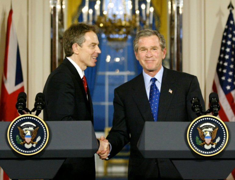 President Bush shakes hands with British Prime Minister Tony Blair