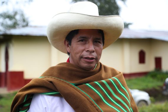 Free Peru party presidential candidate Pedro Castillo poses for a photo on his land in Chugur, Peru, April 16, 2021.