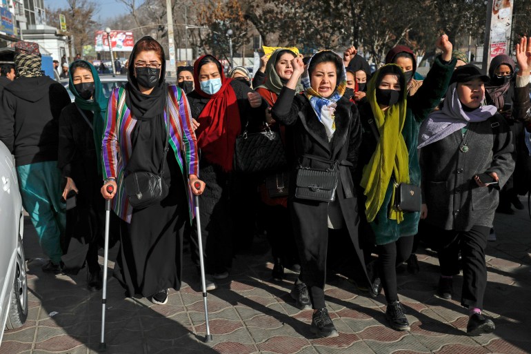 Afghan women chant slogans during a protest against the ban on university education for women, in Kabul, Afghanistan, December 22, 2022 [AP Photo]