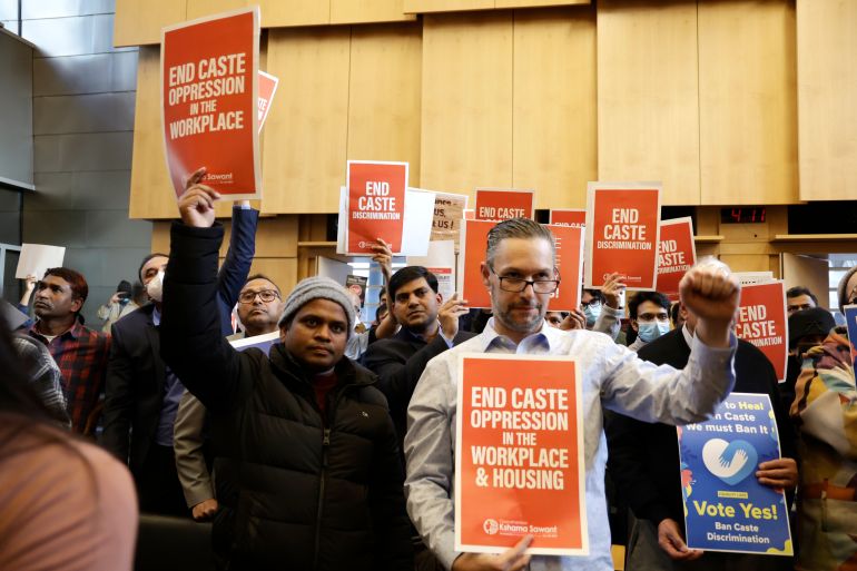 People react to discussion of the ordinance to add caste to Seattle's anti-discrimination laws in the Seattle City Council champers, Tuesday, Feb. 21, 2023, in Seattle. Council Member Kshama Sawant proposed the ordinance. (AP Photo/John Froschauer)