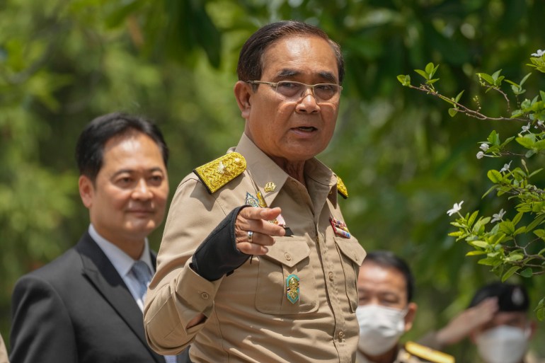 Prayuth Chan-ocha, wearing a military uniform, after annoucing the dissolution of parliament.