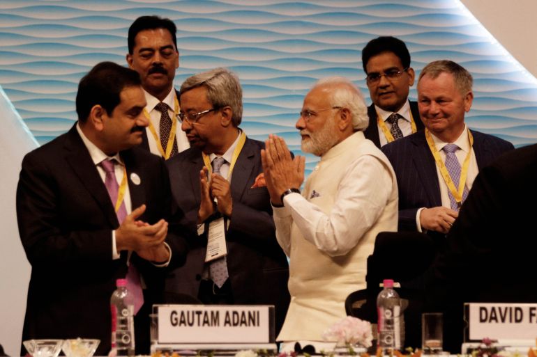Prime Minister Narendra Modi with Gautam Adani, chairman and founder of the Adani Group, and other delegates at Vibrant Gujarat Global Summit, at Mahatma Mandir Exhibition cum Convention Centre, on January 18, 2019 in Gandhinagar, India