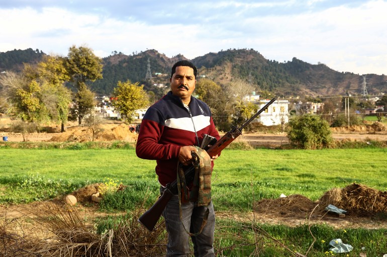 Authorities distribute SLR Rifles among Ex-servicemen after Village defence groups or VDCs were being revamped in Dhangri Village of Rajouri Jammu and Kashmir