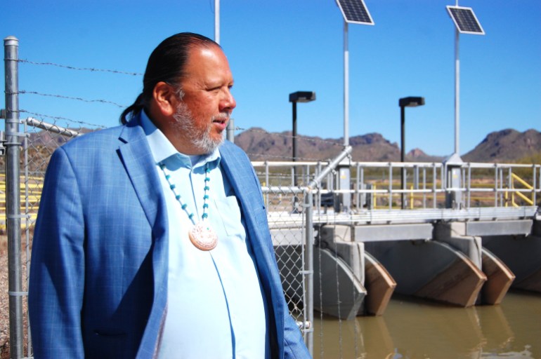 Gila River Indian Community Governor Stephen Lewis stands alongside a managed aquifer recharge site, in Gila River Indian Community, Arizona, US